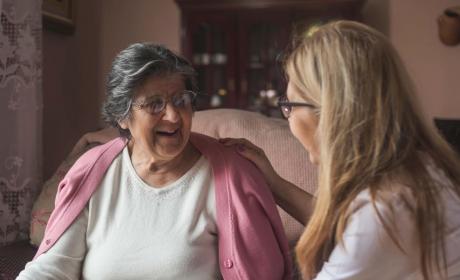 Carer and resident in a home