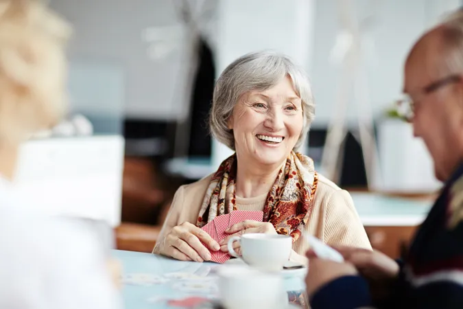 Older adults chatting and smiling