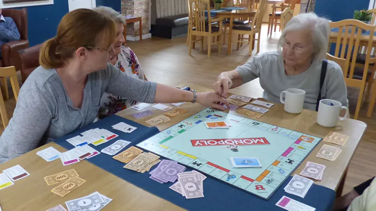 People playing Monopoly in Adams House