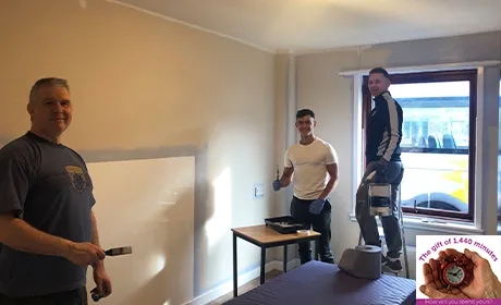 3 men painting a bedroom